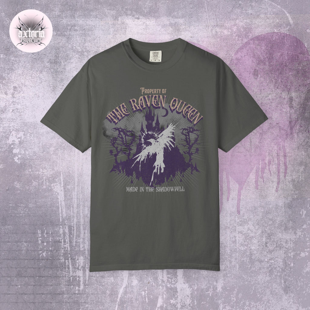 Gray D&D TTRPG t-shirt with 'Property of the Raven Queen Made in the Shadowwell' design on a textured gray background