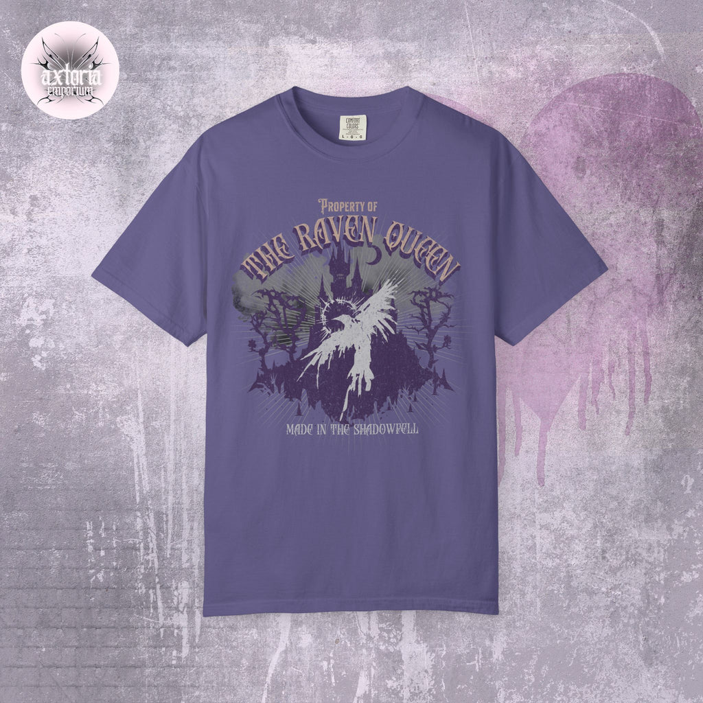 Purple Dungeons and Dragons t-shirt with 'The Raven Queen' graphic design on a textured gray background