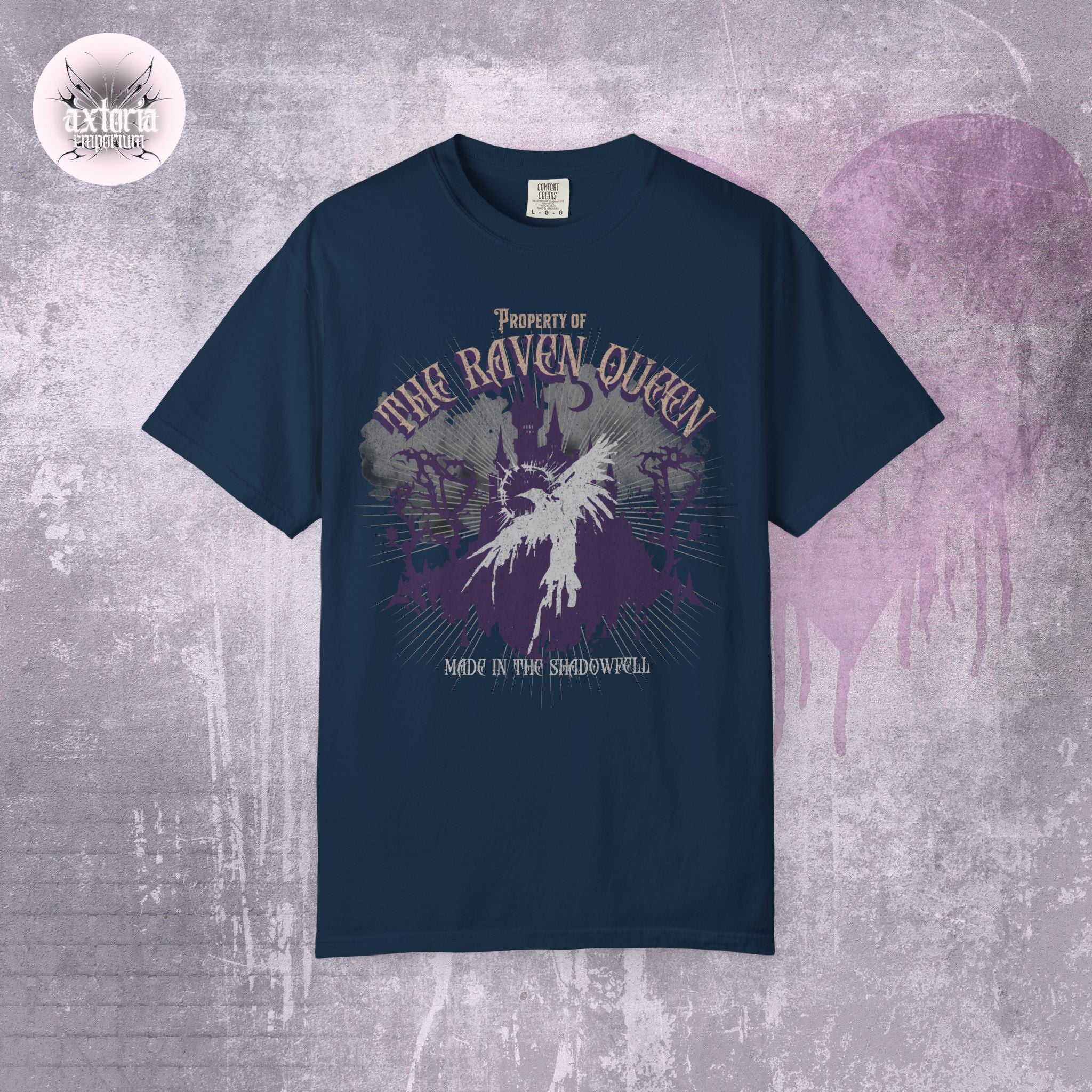 Navy blue Dungeons and Dragons TTRPG t-shirt with graphic design and text on a textured gray background